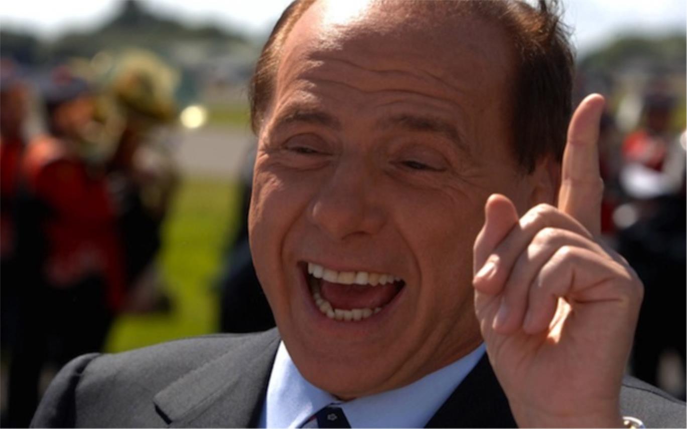 berlusconi_describes_obama_young_handsome_tanned.jpg